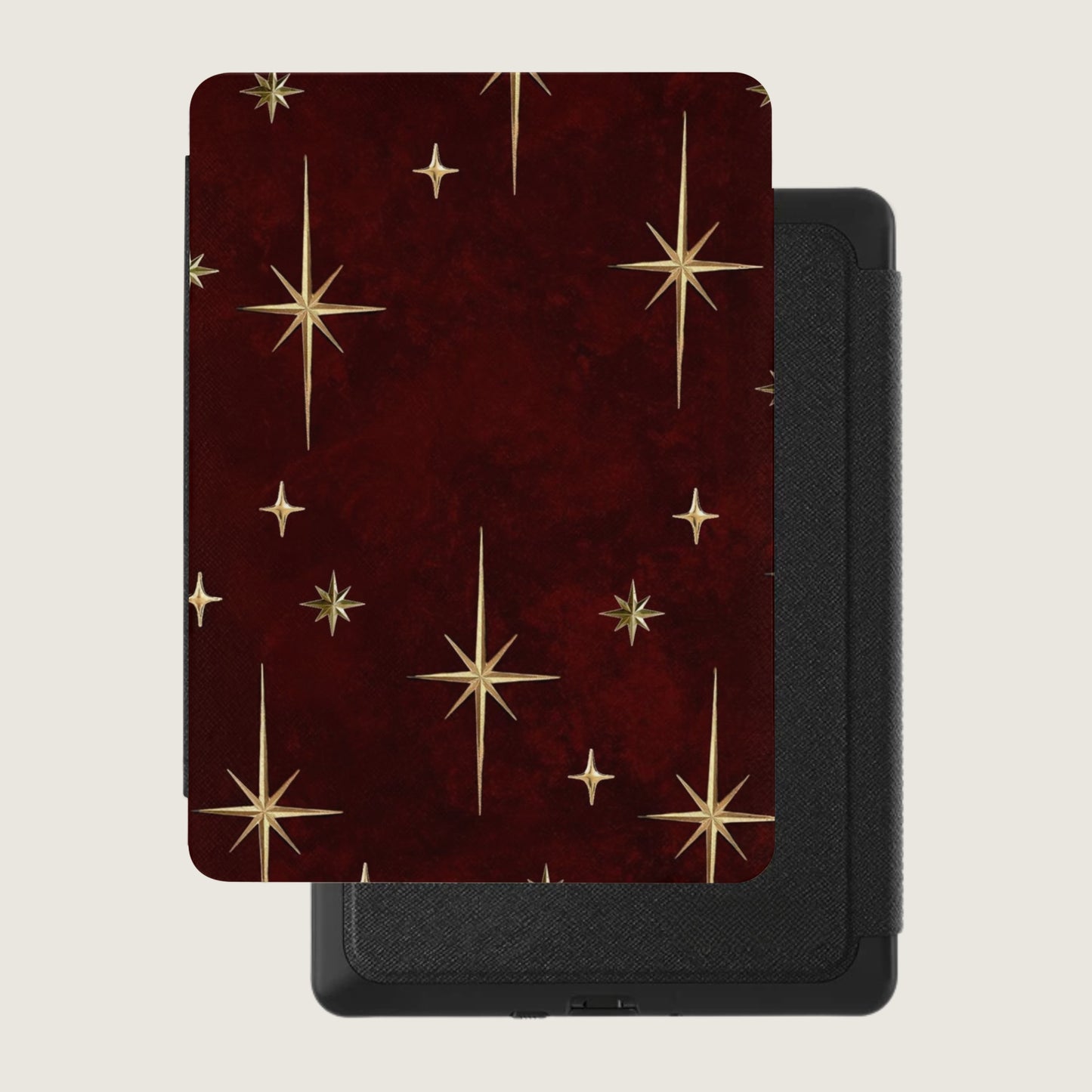 Red case with gold starburst pattern on a black device with textured finish.