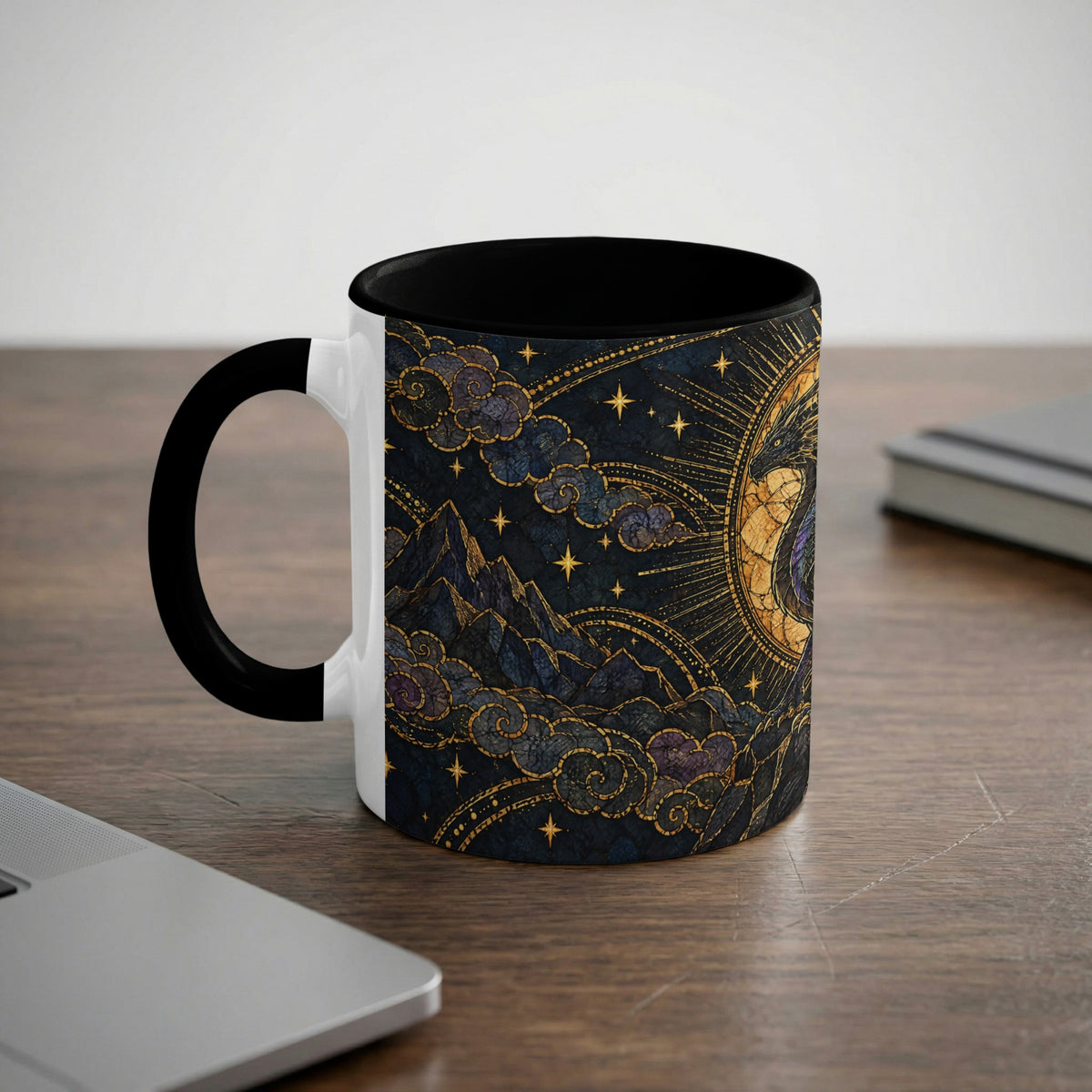 A white ceramic mug with a black handle and interior features a celestial dragon and mountain illustration.
