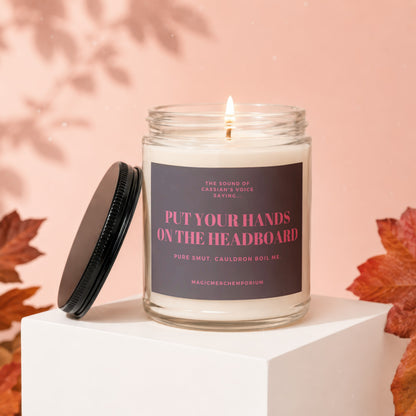 Candle with text "Put Your Hands on the Headboard" and "Pure Smut. Cauldron Boil Me.".