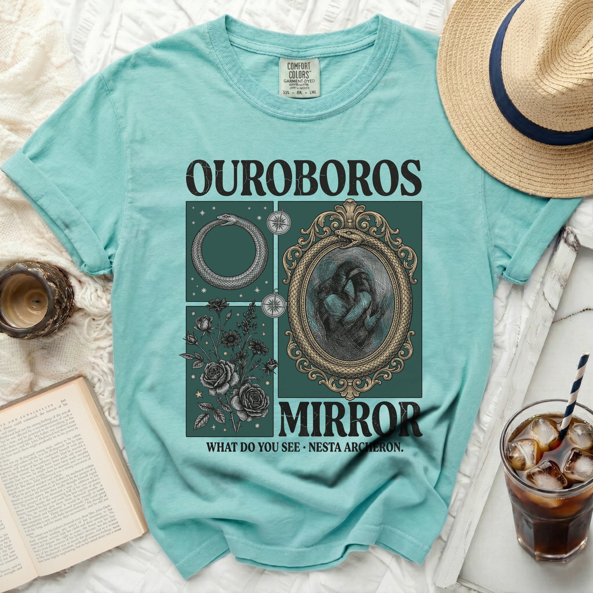 Ouroboros Mirror graphic tee with floral and snake designs.
