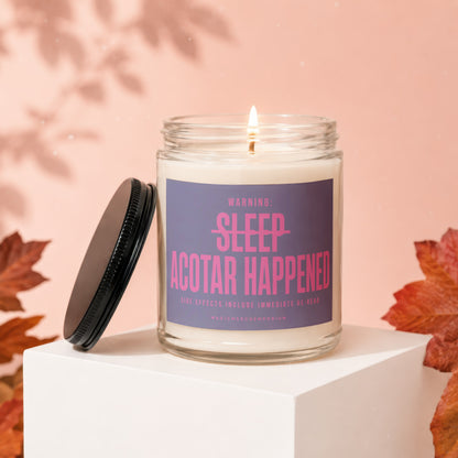 Lit candle in glass jar with purple label reading "WARNING: SLEEP ACOTAR HAPPENED".