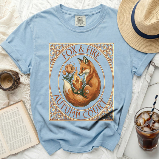 Blue t-shirt with "Fox & Fire Autumn Court" circular graphic.