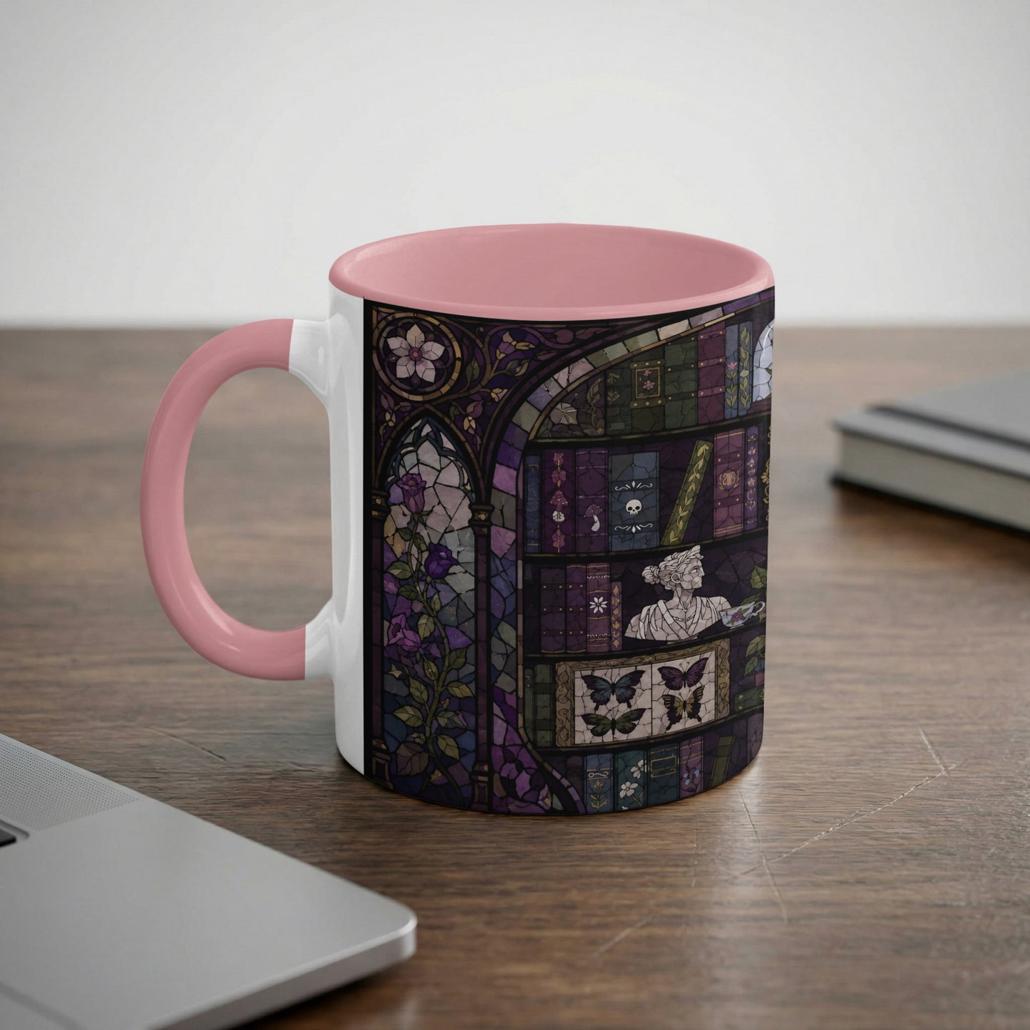 Mug with a dark, stained glass design featuring books, flowers, and butterflies.