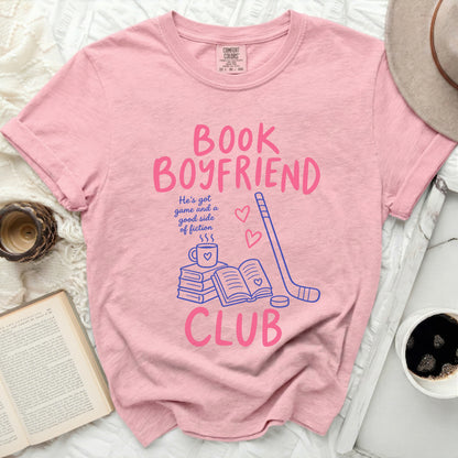 Comfort Colors t-shirt with "Book Boyfriend Club" graphic and hockey stick.