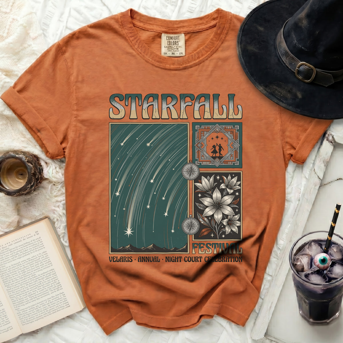 Orange t-shirt with "STARFALL FESTIVAL" text and starry night sky graphic.