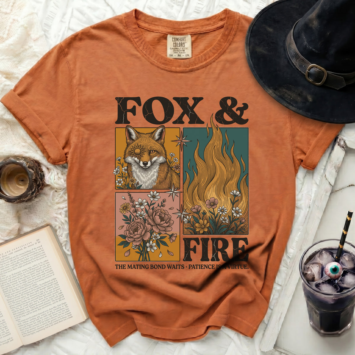 Orange t-shirt with "FOX & FIRE" graphic featuring a fox, flames, and flowers.