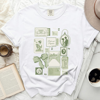 White t-shirt with "Pride and Prejudice" themed green graphic including portraits and buildings.