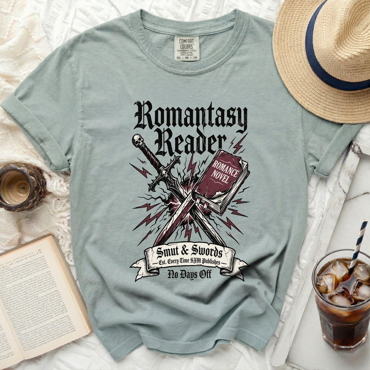T-shirt with "Romantasy Reader" design, sword, book, and lightning bolts.
