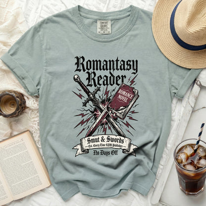 T-shirt with "Romantasy Reader" design, sword, book, and lightning bolts.