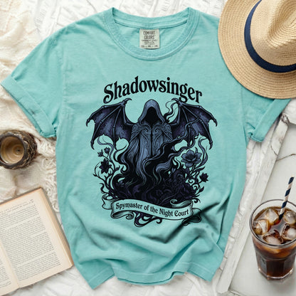 Teal t-shirt with "Shadowsinger" and "Spymaster of the Night Court" graphic.