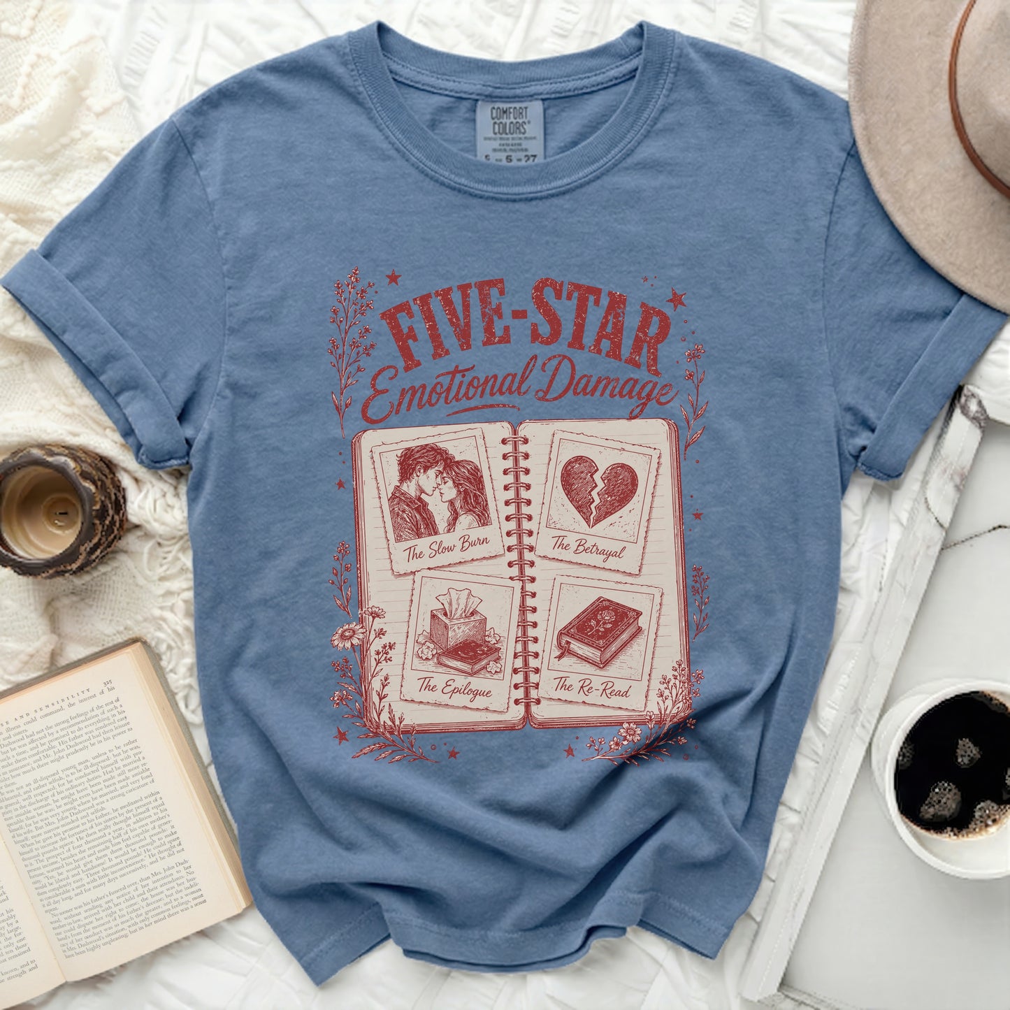 Blue t-shirt with "FIVE-STAR Emotional Damage" and book chapter titles.