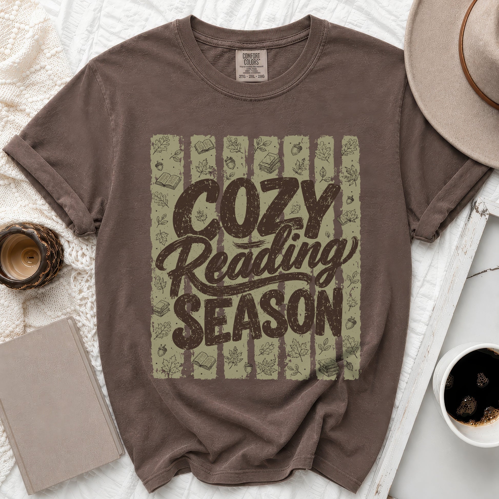 Brown t-shirt with "Cozy Reading Season" text and autumn leaf graphics.