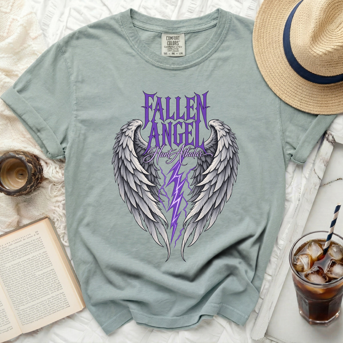 Light blue t-shirt with "FALLEN ANGEL Hunt Athdar" graphic featuring wings and lightning.