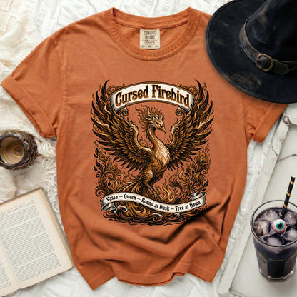 Orange t-shirt with a phoenix design and "Cursed Firebird" text.