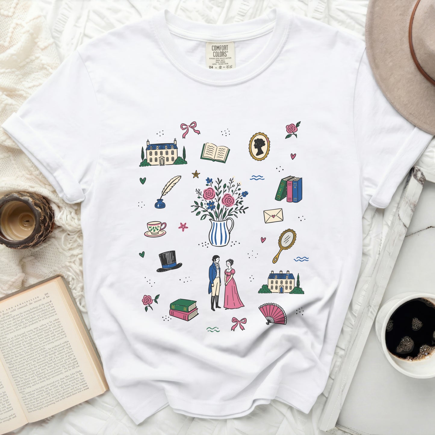 White t-shirt with a repeating pattern of Regency-era motifs.