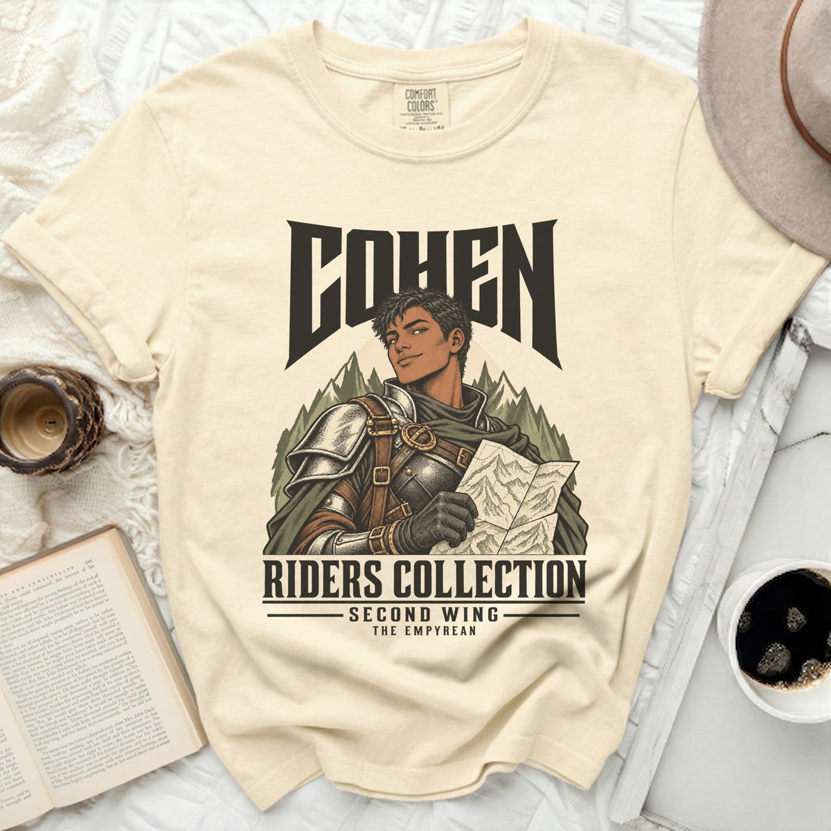 Cream t-shirt with "COHEN RIDERS COLLECTION SECOND WING THE EMPYREAN" graphic.