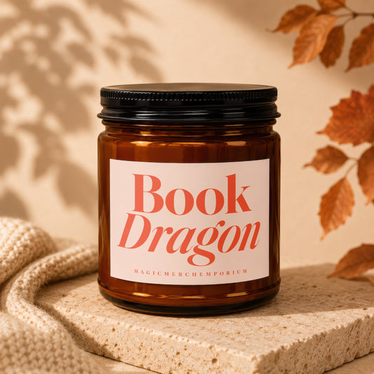 Amber jar candle with "Book Dragon" and "MAGICMERCHEMPORIUM" text.