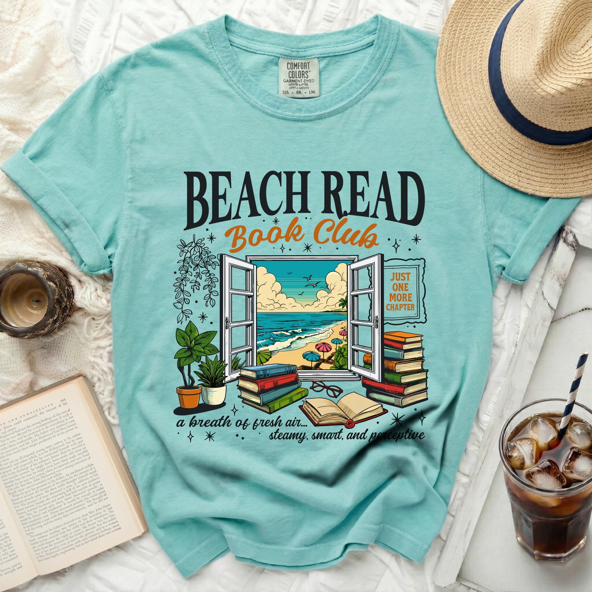 Teal t-shirt with "Beach Read Book Club" graphic and beach scene.