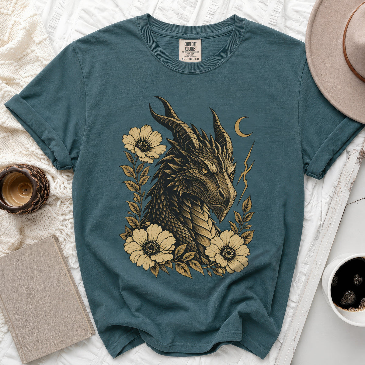 Teal t-shirt with a gold dragon head and floral design. Comfort Colors XL.