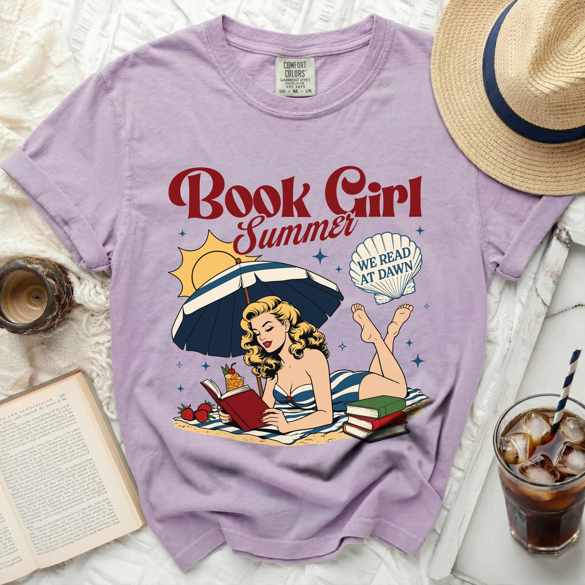Purple t-shirt with "Book Girl Summer We Read at Dawn" graphic.