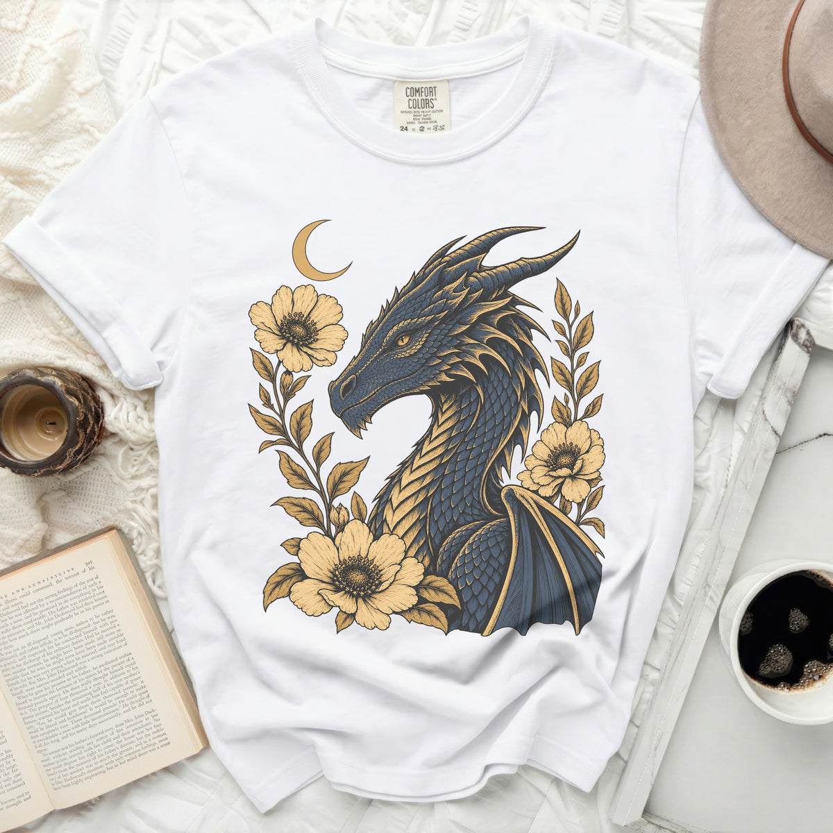 White t-shirt with a dark blue and gold dragon and yellow flowers graphic.