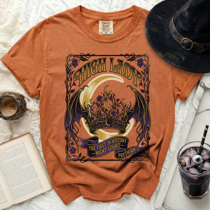 Orange t-shirt with "High Lady" and moon graphic, "The First In History Night Court Prythian" text.