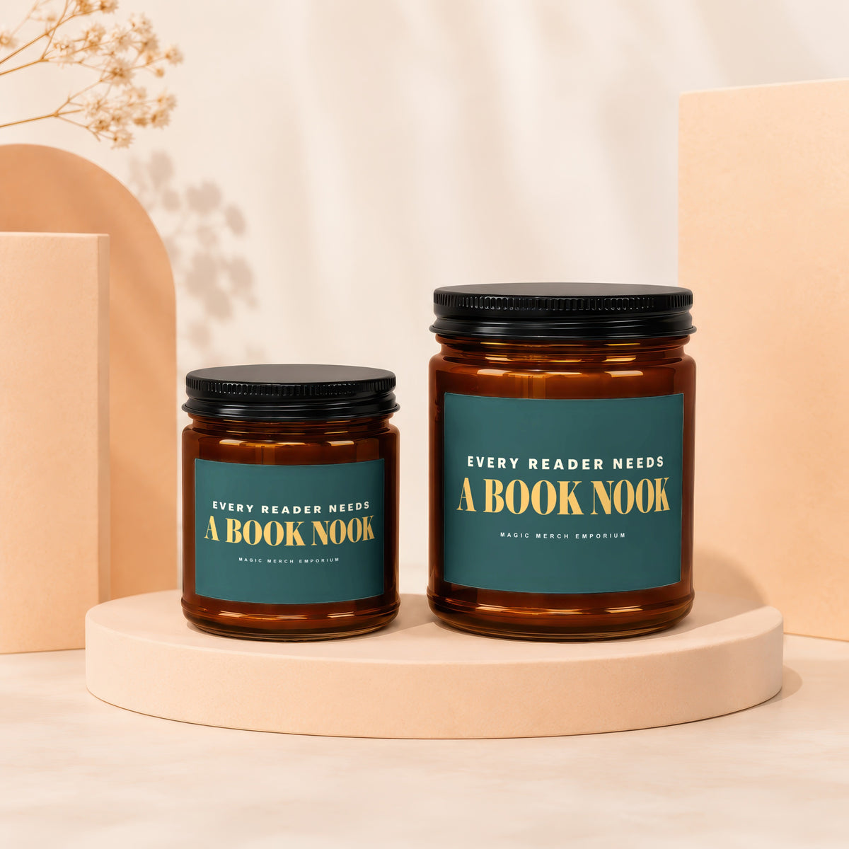 Two amber glass jars with black lids, one larger than the other.