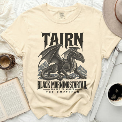 T-shirt with a black dragon graphic and text "TAIRN BLACK MORNINGSTARTAIL BONDED TO VIOLET THE EMPYREAN".