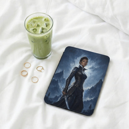 Tablet case with fantasy warrior on a mountain landscape with iced drink and rings.