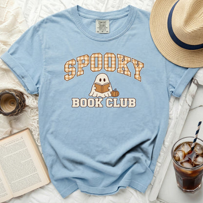 Light blue t-shirt with "Spooky Book Club" graphic of a ghost reading a book.