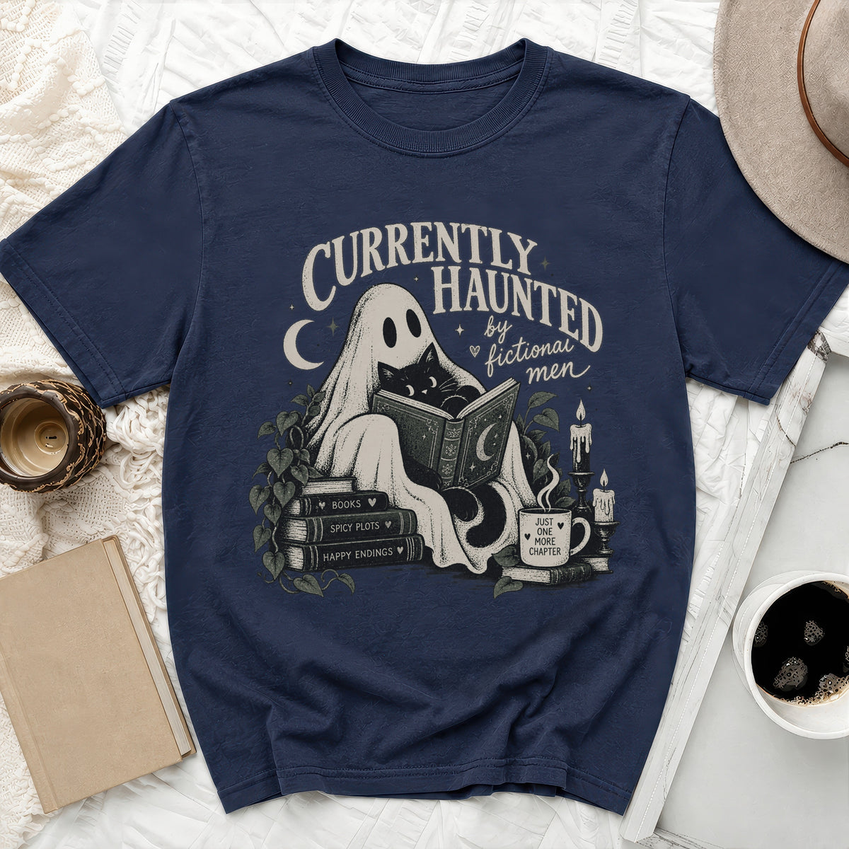 Navy t-shirt with ghost, cat, and books graphic. Text reads "Currently Haunted by Fictional Men".