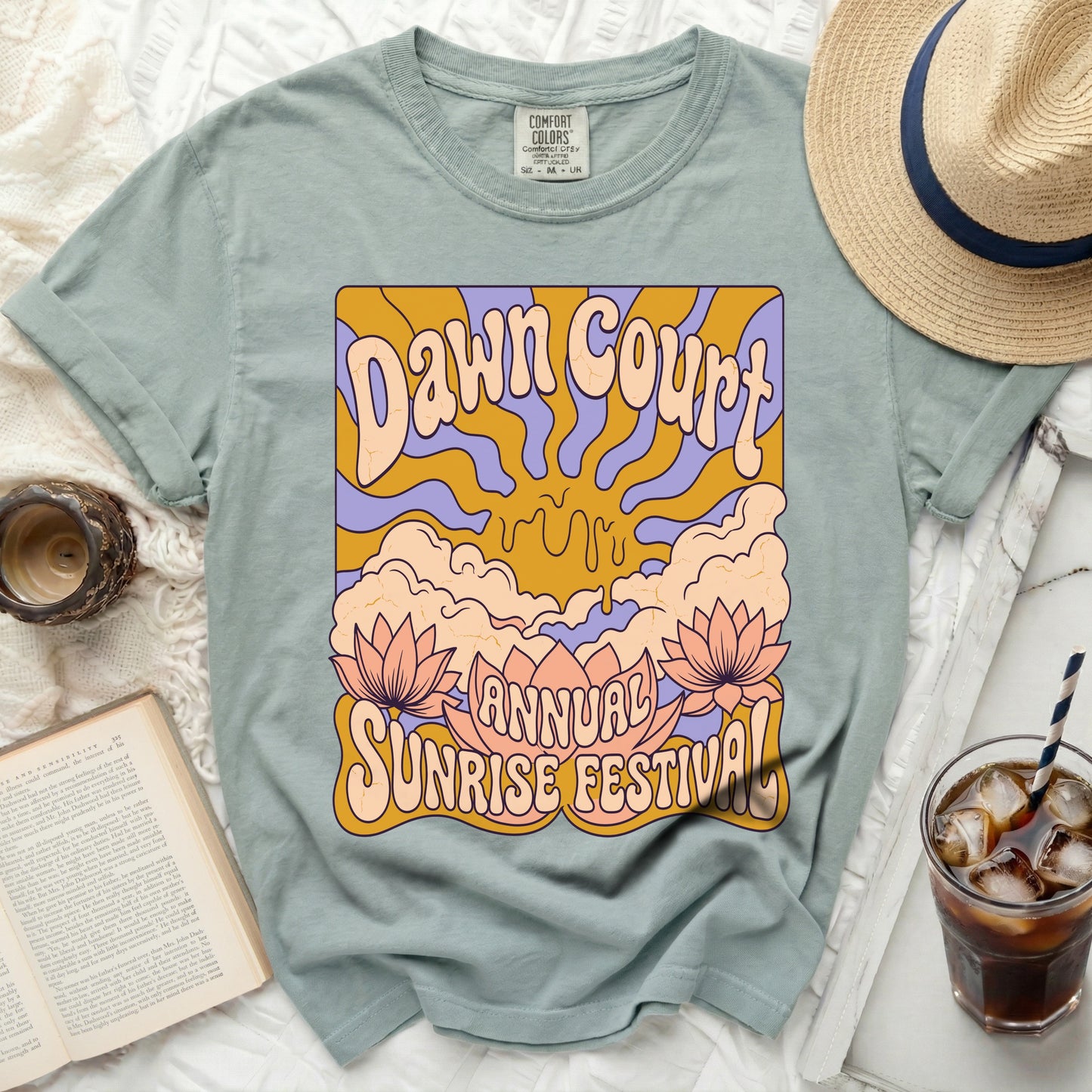 Dawn Court Annual Sunrise Festival graphic t-shirt with lotus flowers.