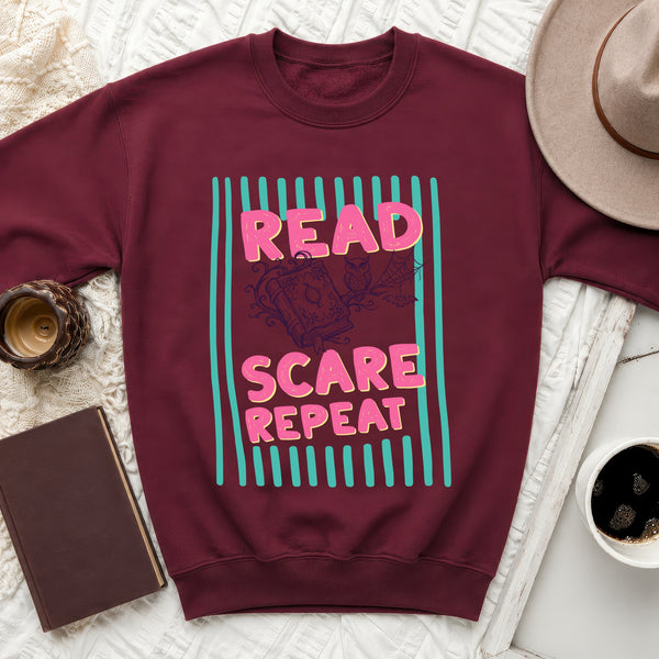 Read, Scare, Repeat Sweatshirt in Maroon