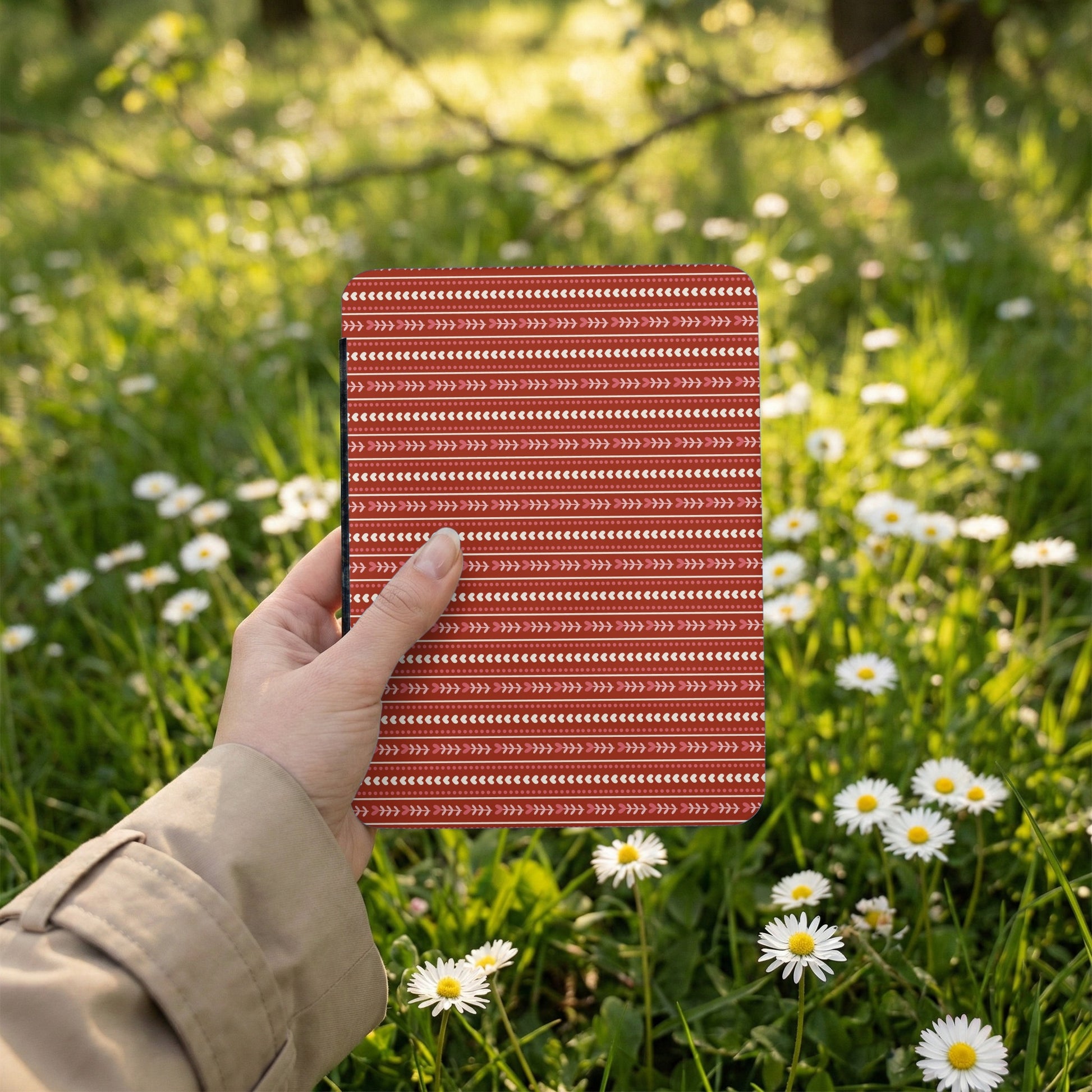 Hand Holding Stylish Aesthetic Red Patterned Notebook