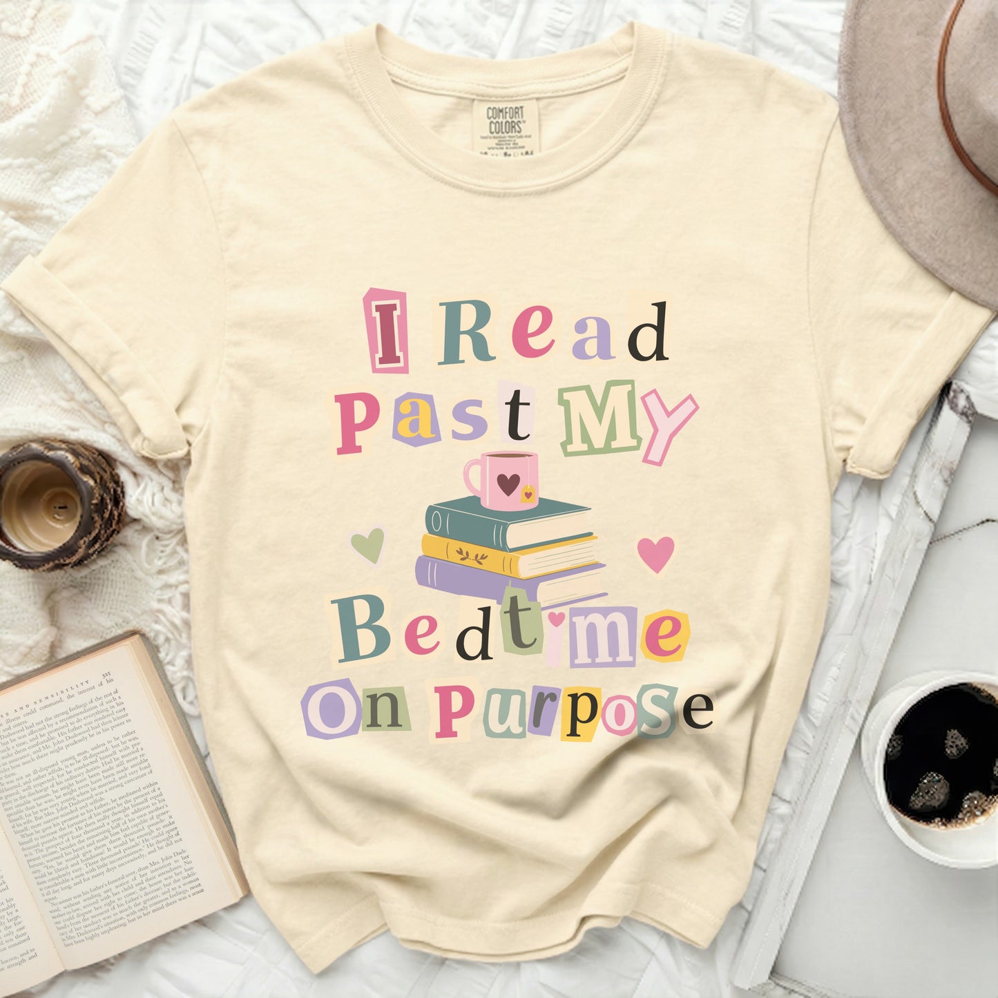 Comfort Colors beige t-shirt with "I Read Past My Bedtime On Purpose" graphic.