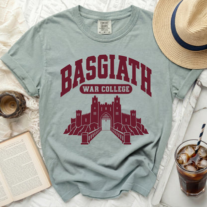 Teal Comfort Colors t-shirt with "Basgiath War College" text and castle graphic.