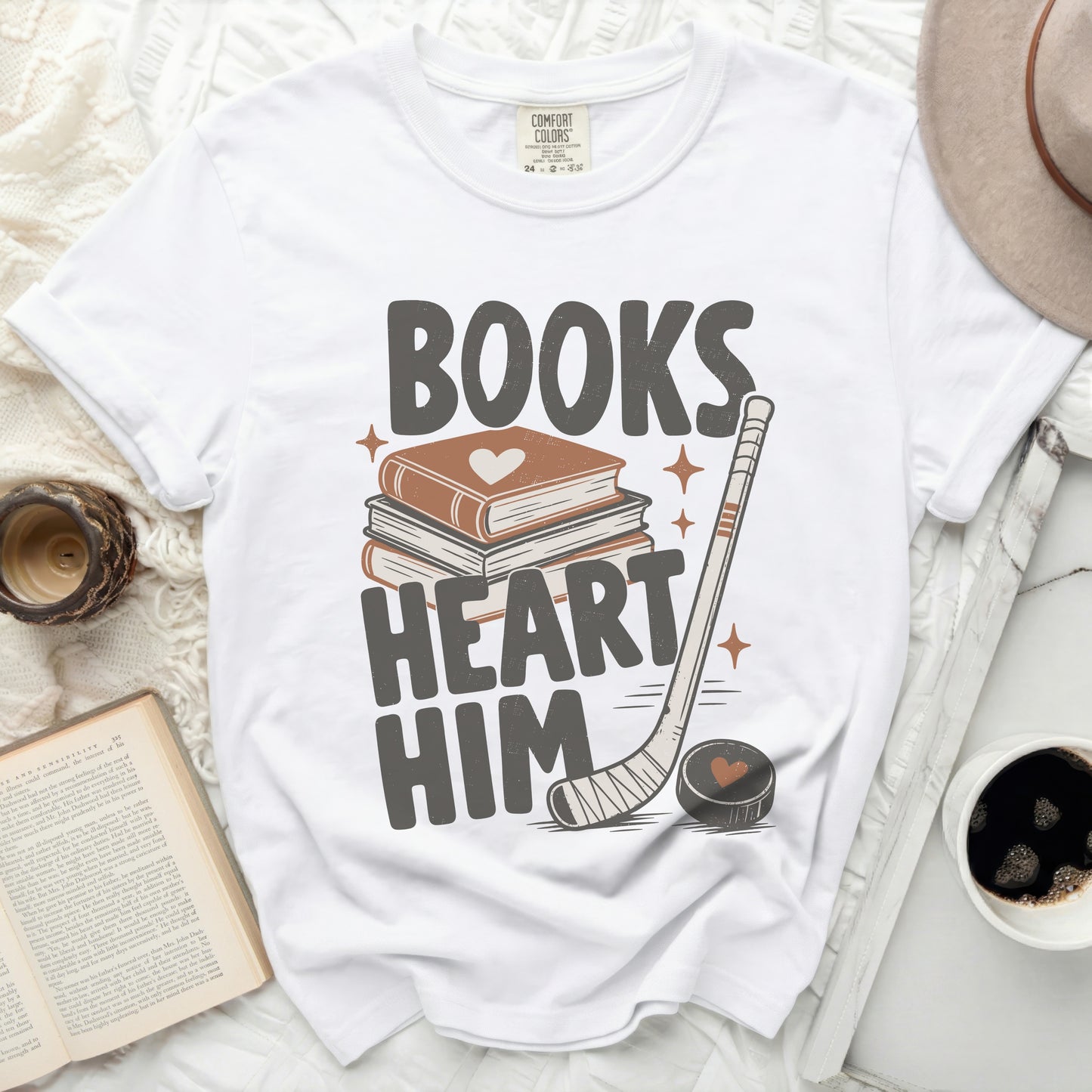 Books Heart Him text graphic with books and hockey stick.