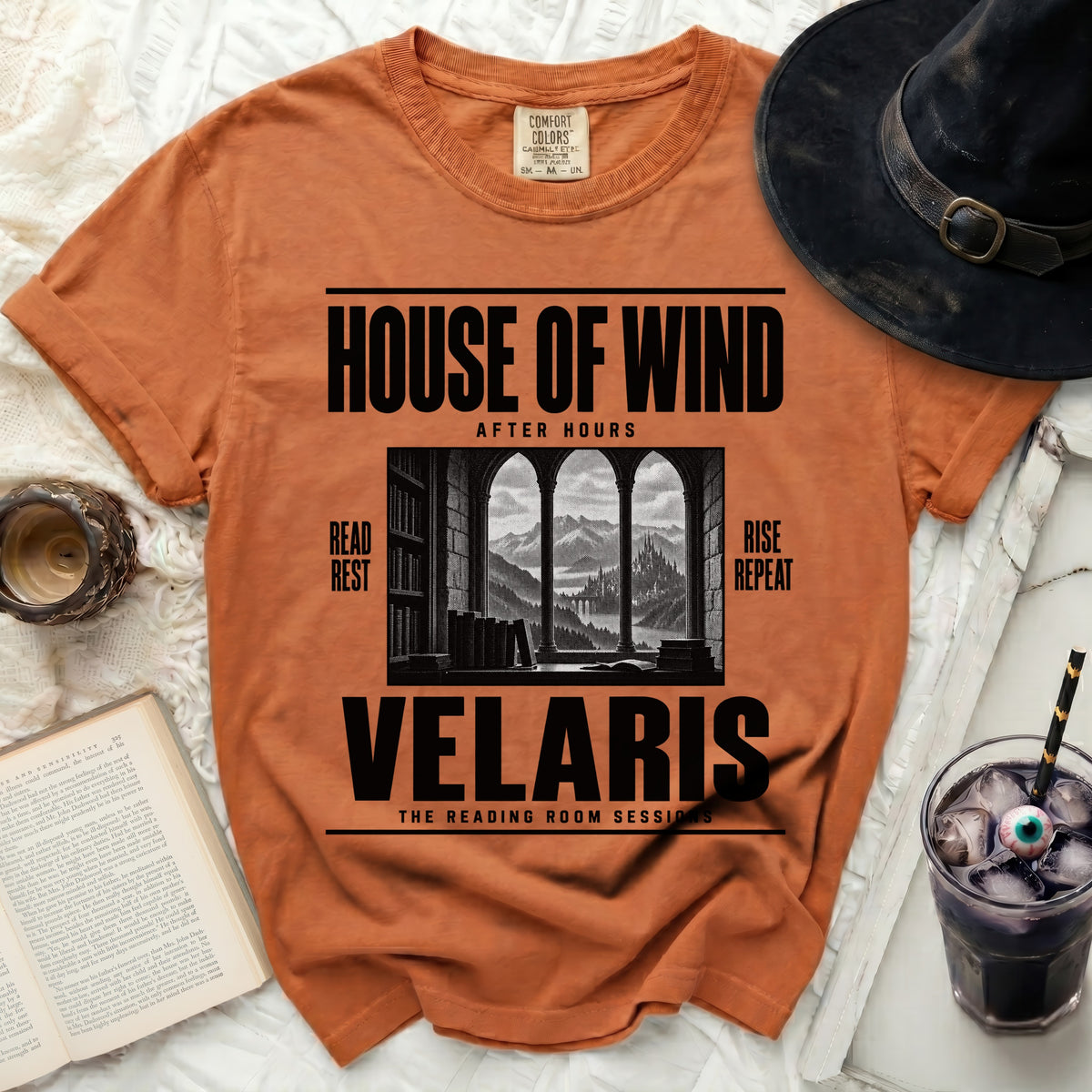 Orange t-shirt with "House of Wind After Hours Velaris The Reading Room Sessions" text.