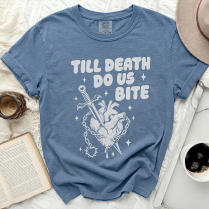 Blue t-shirt with "TILL DEATH DO US BITE" and heart-sword graphic.