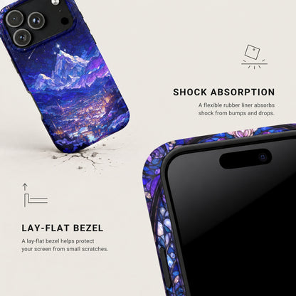 A blue and purple stained-glass style phone case featuring a snowy mountain and illuminated city below.