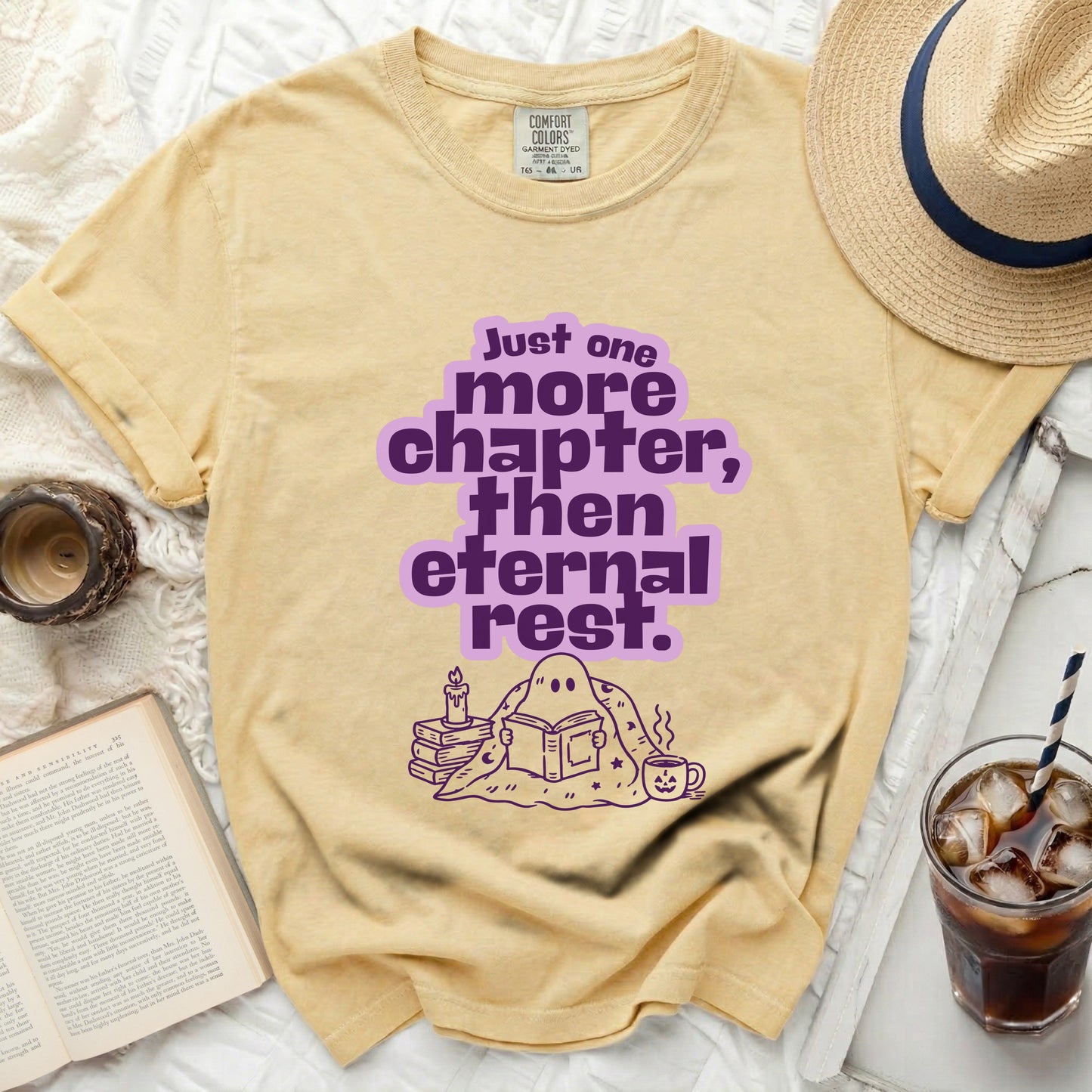 Yellow t-shirt with "Just one more chapter, then eternal rest" text and ghost graphic.