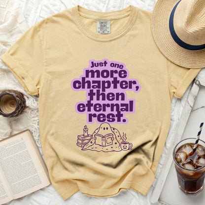 Yellow t-shirt with "Just one more chapter, then eternal rest" text and ghost graphic.