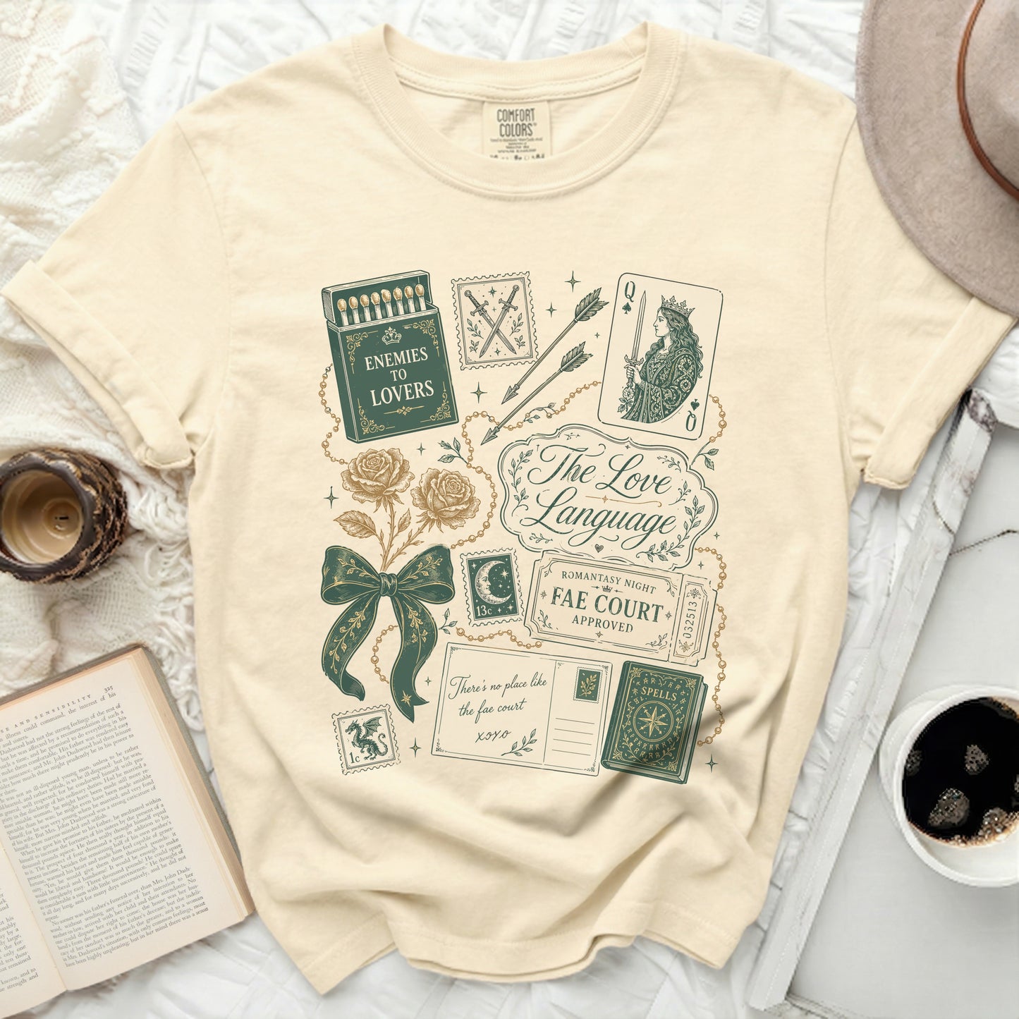 Graphic tee with vintage-style illustrations of playing cards, matches, and celestial motifs.