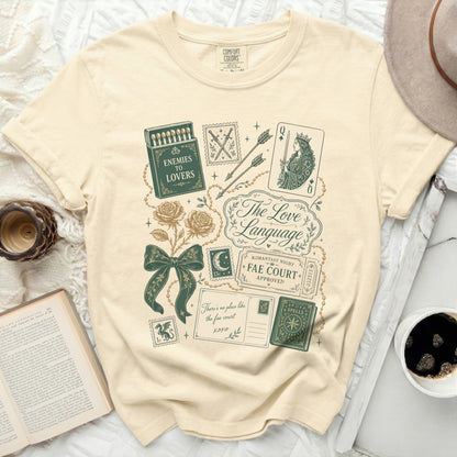 Graphic tee with vintage-style illustrations of playing cards, matches, and celestial motifs.