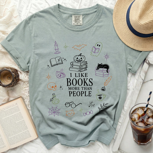 Spooky Reader Every Page a Spell Tee in Bay