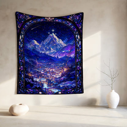 Stained glass tapestry of a snowy mountain village at night under a starry sky.