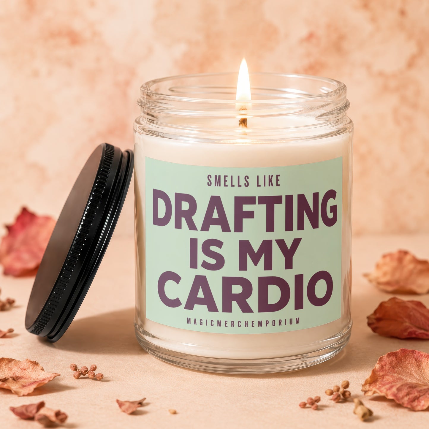 Candle with text "Smells like Drafting is my Cardio" from MagicMerchEmporium.