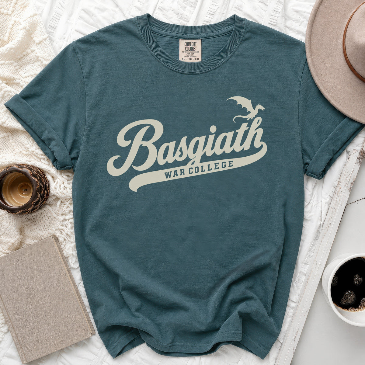 Teal t-shirt with "Basgiath War College" and a dragon graphic.