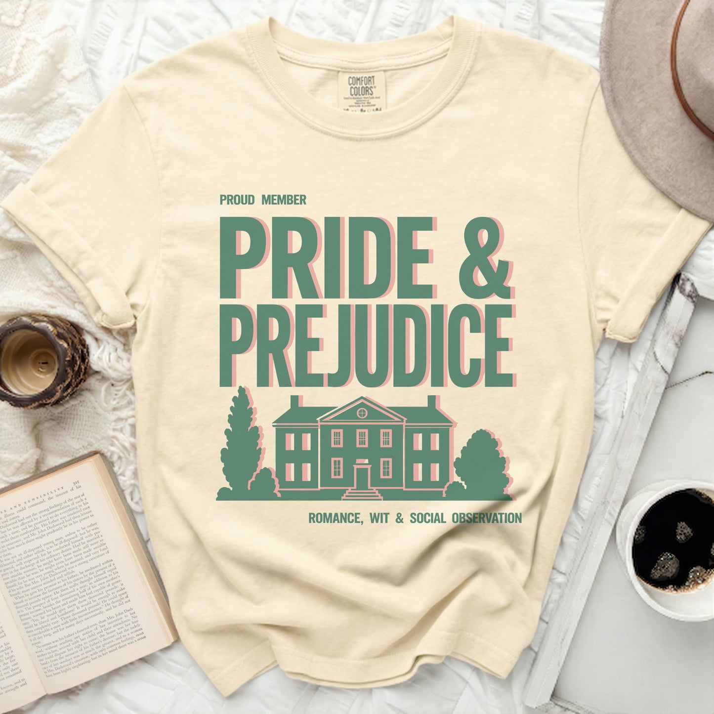 Proud member Pride & Prejudice t-shirt with house graphic.