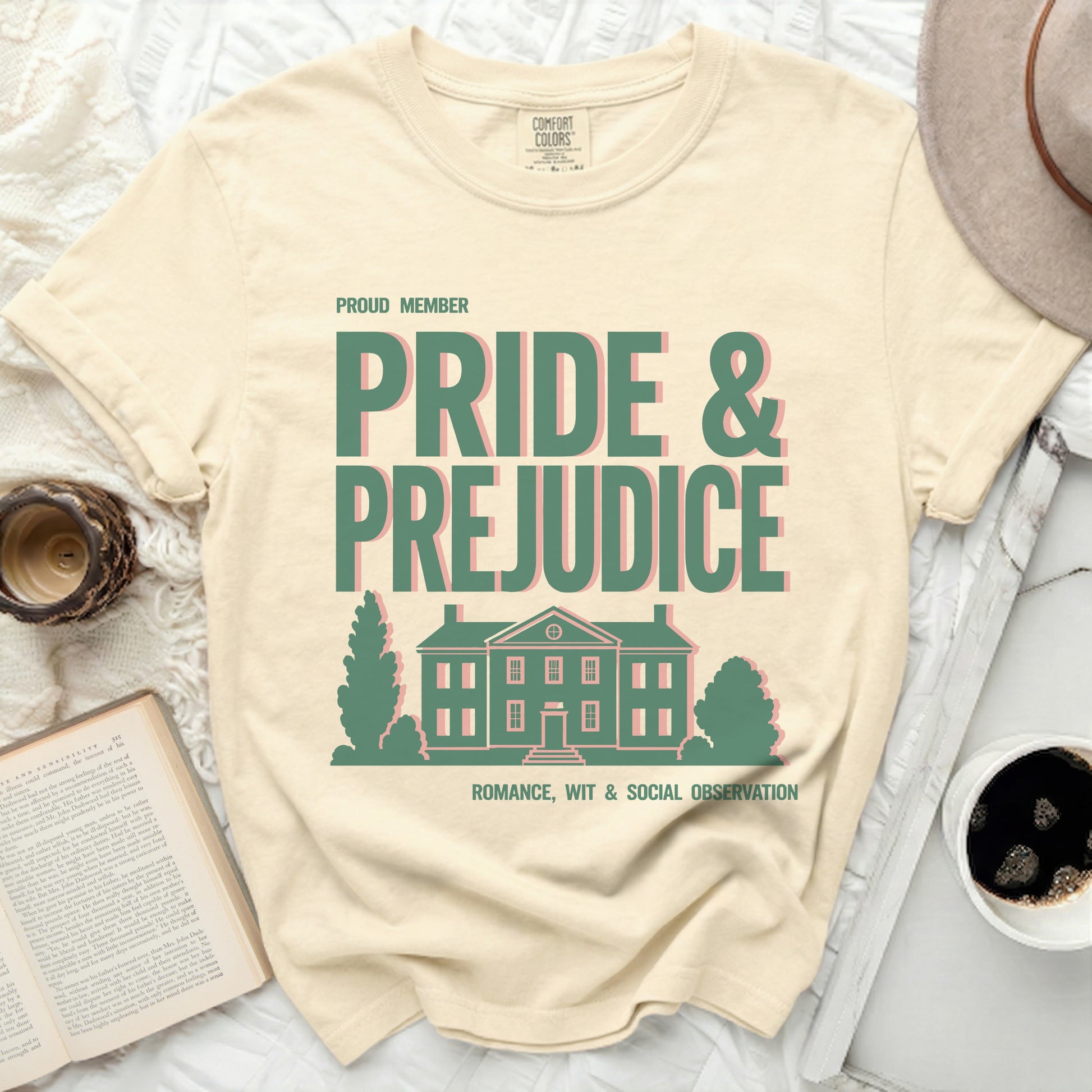 Proud member Pride & Prejudice t-shirt with house graphic.